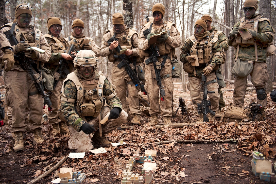 U.S. Marine Corps officers receive a briefing during urban operations