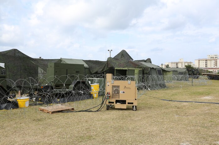 A picture of the forward Command Operations Center, Communication Company (Comm Co), 3rd Marine Logistics Group, Camp Kinser, Okinawa, Japan, Feb. 26, 2014 during exercise Key Resolve 14. Key Resolve is an annual command post exercise that ensures the ROK-U.S. Alliance is prepared to defend the Republic of Korea, while training Alliance forces to respond to any potential event on the peninsula.  (U.S. Marine Corps photo by Lance Cpl. Jeraco Jenkins/Released.)