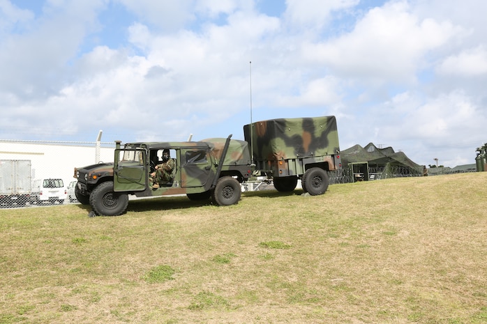 A picture of the forward Command Operations Center, Communication Company (Comm Co), 3rd Marine Logistics Group, Camp Kinser, Okinawa, Japan, Feb. 26, 2014 during exercise Key Resolve 14. Key Resolve is an annual command post exercise that ensures the ROK-U.S. Alliance is prepared to defend the Republic of Korea, while training Alliance forces to respond to any potential event on the peninsula.  (U.S. Marine Corps photo by Lance Cpl. Jeraco Jenkins/Released.)