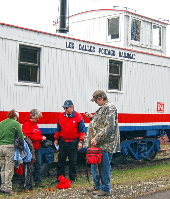 The Dalles Lock and Dam Visitor Center hosted its first-ever geocaching event Sat., March 29, 2014.

The Amazing Race, Geocache Style drew more than 50 people of all ages and skill levels, who each braved the erratic weather to participate in this outdoor treasure hunt.

For many participants, it was their first experience with geocaching, but park rangers and volunteers assisted them with using a GPS to guide them to the hidden treasures.

 Five geocaches were placed specifically for this event at Seufert and Patterson parks and the connecting Riverfront Trail. Each geocache was stuffed with items promoting water safety, reminding everyone to play it safe and always wear a life jacket!

Upon completion of the race, all participants received a certificate of completion, signed by a park ranger.  

When a family of smiling faces returned to the visitor center, they were asked if they would go geocaching again. “Yes! We are hooked now,” said participant Jenni Nuzzi.

“It is great to see people bringing their friends and family outdoors to use technology and enjoy the day," said Emma Nelson, a Park Ranger at The Dalles Lock and Dam. "Despite the moody weather, everyone left with goodies in their bags and smiles on their faces.” 