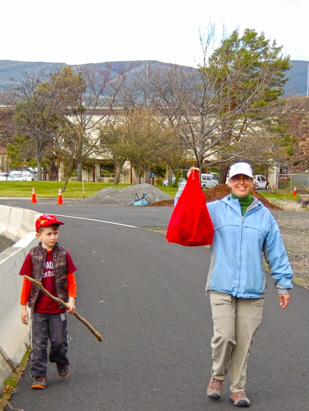 The Dalles Lock and Dam Visitor Center hosted its first-ever geocaching event Sat., March 29, 2014.

The Amazing Race, Geocache Style drew more than 50 people of all ages and skill levels, who each braved the erratic weather to participate in this outdoor treasure hunt.

For many participants, it was their first experience with geocaching, but park rangers and volunteers assisted them with using a GPS to guide them to the hidden treasures.

 Five geocaches were placed specifically for this event at Seufert and Patterson parks and the connecting Riverfront Trail. Each geocache was stuffed with items promoting water safety, reminding everyone to play it safe and always wear a life jacket!

Upon completion of the race, all participants received a certificate of completion, signed by a park ranger.  

When a family of smiling faces returned to the visitor center, they were asked if they would go geocaching again. “Yes! We are hooked now,” said participant Jenni Nuzzi.

“It is great to see people bringing their friends and family outdoors to use technology and enjoy the day," said Emma Nelson, a Park Ranger at The Dalles Lock and Dam. "Despite the moody weather, everyone left with goodies in their bags and smiles on their faces.” 
