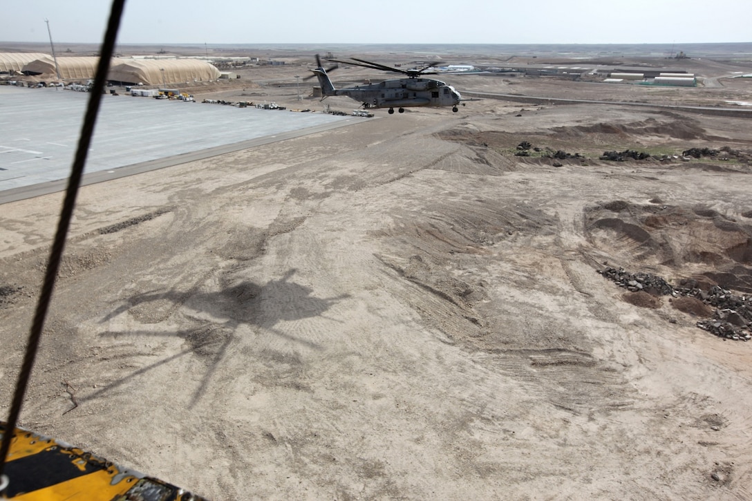 A CH-53E Super Stallion with Marine Heavy Helicopter Squadron 466 flies out on its second mission in Helmand province, Afghanistan, April 2, 2014. The Super Stallions set out for an aerial reconnaissance mission in support of ground troops by flying over areas of interest and bringing back requested information. (USMC Photo By: Sgt. Frances Johnson/Released)