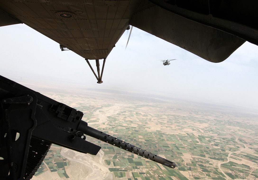 A CH-53E Super Stallion with Marine Heavy Helicopter Squadron 466 flies out for an aerial reconnaissance mission over Helmand province, Afghanistan, April 2, 2014. The Super Stallions conducted an aerial reconnaissance mission in support of ground troops by flying over areas of interest and bringing back requested information. (USMC Photo By: Sgt. Frances Johnson/Released)