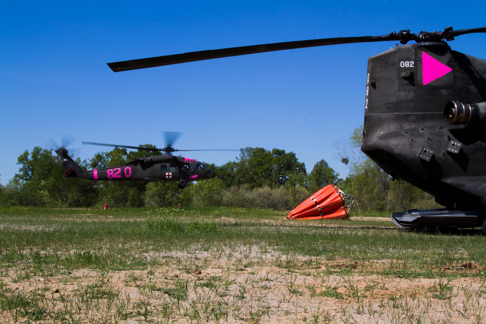 A California Army National Guard UH-60 Black Hawk helicopter from Company F, 2-135th General Support Aviation Battalion, sets down at a landing zone at the California Department of Forestry and Fire Protection (Cal Fire) annual joint fire training at the Cal Fire Academy in Ione, Calif., April 5, 2014. The California Guard trained with Cal Fire and other civilian agencies at Ione in preparation for the highly anticipated upcoming fire season. 