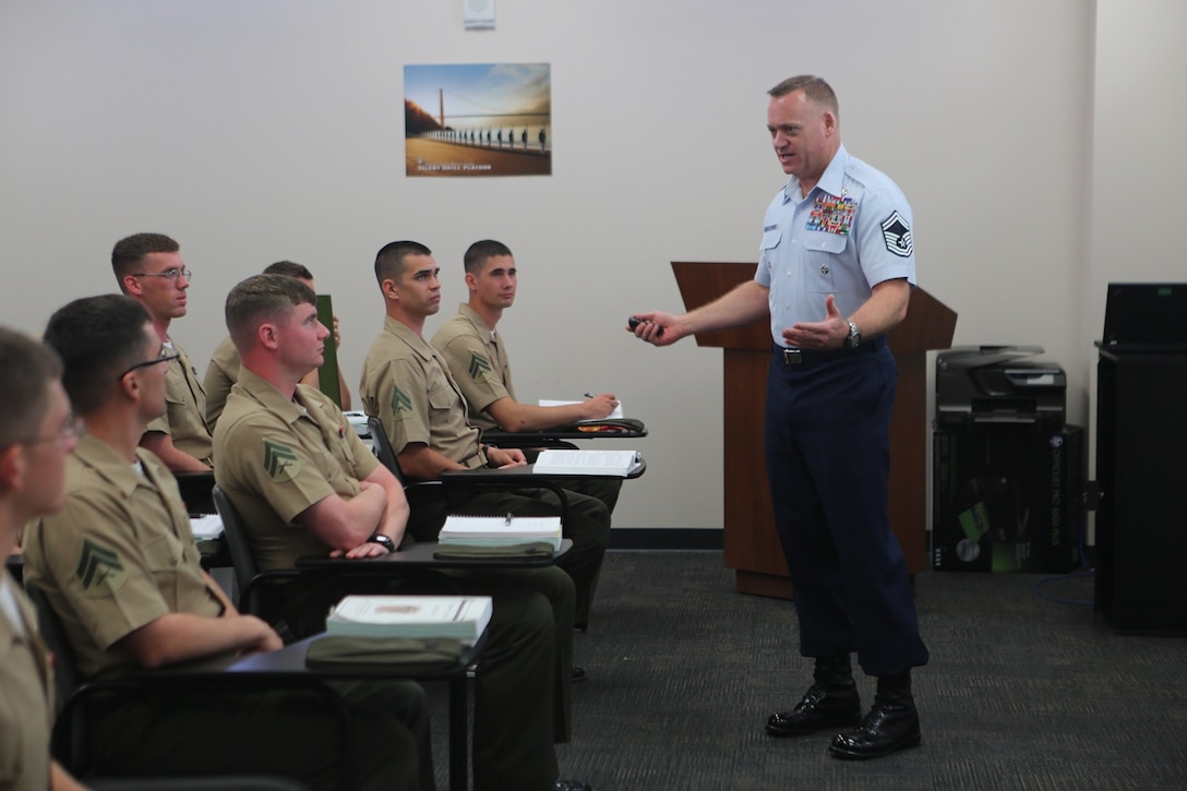 Senior Master Sgt. Bradley Reilly, an instructor with Joint Special Operation Forces Senior Enlisted Academy, gives Marines attending the 1st Intelligence Battalion Corporals Corse a class on irregular warfare aboard Camp Pendleton Calif., April 4. Reilly, a Silver Star recipient, talked about his experiences during combat and explained to the corporals why it is important to know the difference between conventional and irregular warfare.  