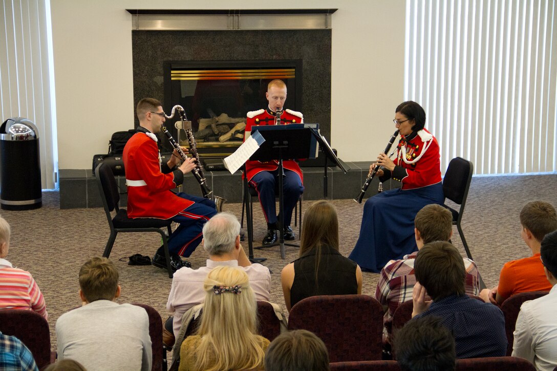 On April 6, 2014, Staff Sgts. Christopher Grant and Andrew Dees, and Gunnery Sgt. Michelle Urzynicok performed a pre-concert program at Rachel M. Schlesinger Concert Hall and Arts Center for high school students from Vancouver, Canada. (U.S. Marine Corps photo by Gunnery Sgt. Amanda Simmons/released)