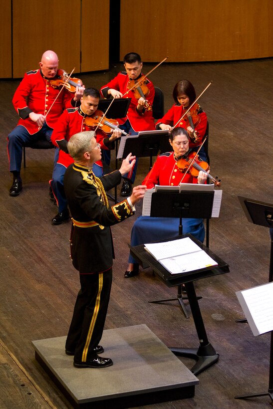 On April 6, 2014, Marine Band Director Colonel Michael J. Colburn conducted his final Marine Chamber Orchestra concert at the Schlesinger Center in Alexandria, Va. The concert included Rodion Shchedrin’s Carmen Suite and Igor Stravinsky’s Suite from Pulcinella. (U.S. Marine Corps photo by Gunnery Sgt. Amanda Simmons/released)