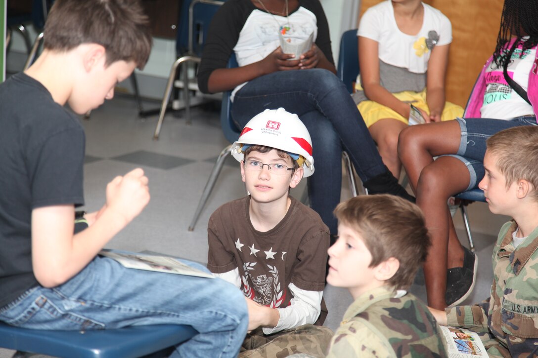 FORT STEWART, Ga. – Students at Diamond Elementary School learn about engineering careers with the Corps during a school-wide "STEMposium" April 4, 2014. The event focused on getting children interested in Science, Technology, Engineering and Math (STEM) career fields. 