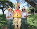 HONOLULU (April 5, 2014) - U.S. Army Corps of Engineers Park Rangers Don Espaniola and Angela Jones say Aloha to Bobber the Water Safety Dog after attending a beach and berm clean up as part of Earth Month 2014 at the Corps' Pacific Regional Visitor Center at Fort DeRussy.  