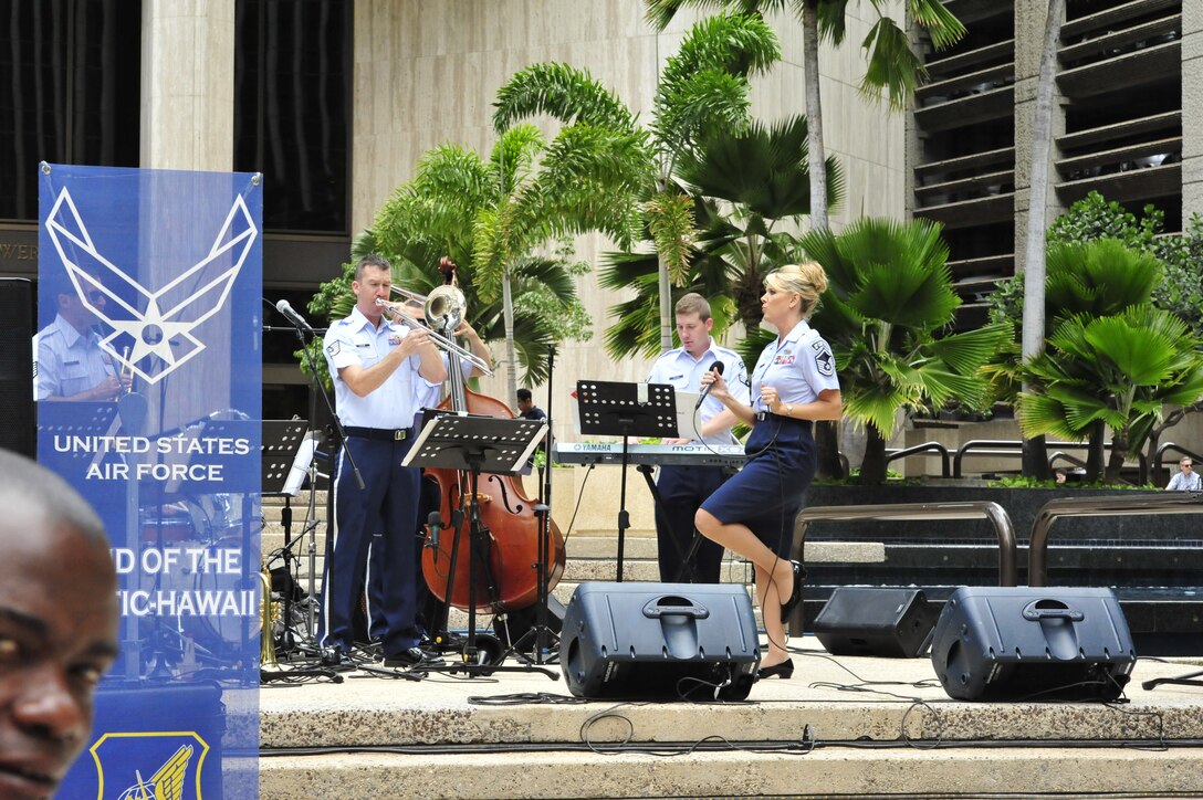 HONOLULU, Hawaii – TSgt Ben Kadow solos on the trombone during " Don't Get Around Much Anymore".Papana, the jazz ensemble with the USAF Band of the Pacific-Hawaii, played at Bishop Square, Apr. 3, 2014. The Band of the Pacific-Hawaii plays over 100 annual public concerts, in efforts to build stronger community and military ties. (US Air Force Photo/SSgt Courtney Clifford/released)