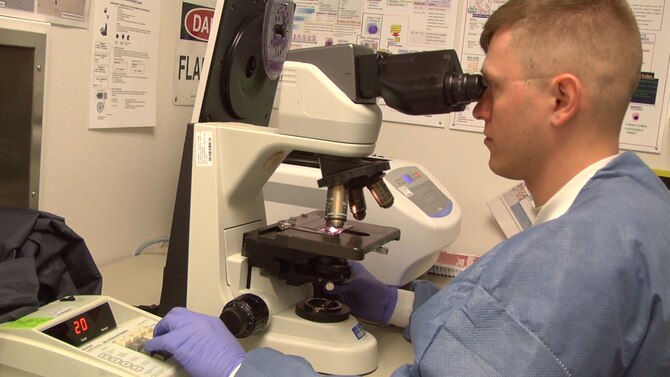 Senior Airman Dallas Hollis, a 940th Aeromedicine Squadron laboratory technician, examines blood samples during the April Unit Training Assembly at the base clinic on Beale Air Force Base, Calif., where he serves as a traditional reservist. Hollis recently transitioned from medical administrator to lab technician, graduating a 13-month technical school with a 97% average in the course. (U.S. Air Force photo/Tech. Sgt. Heather Skinkle)  