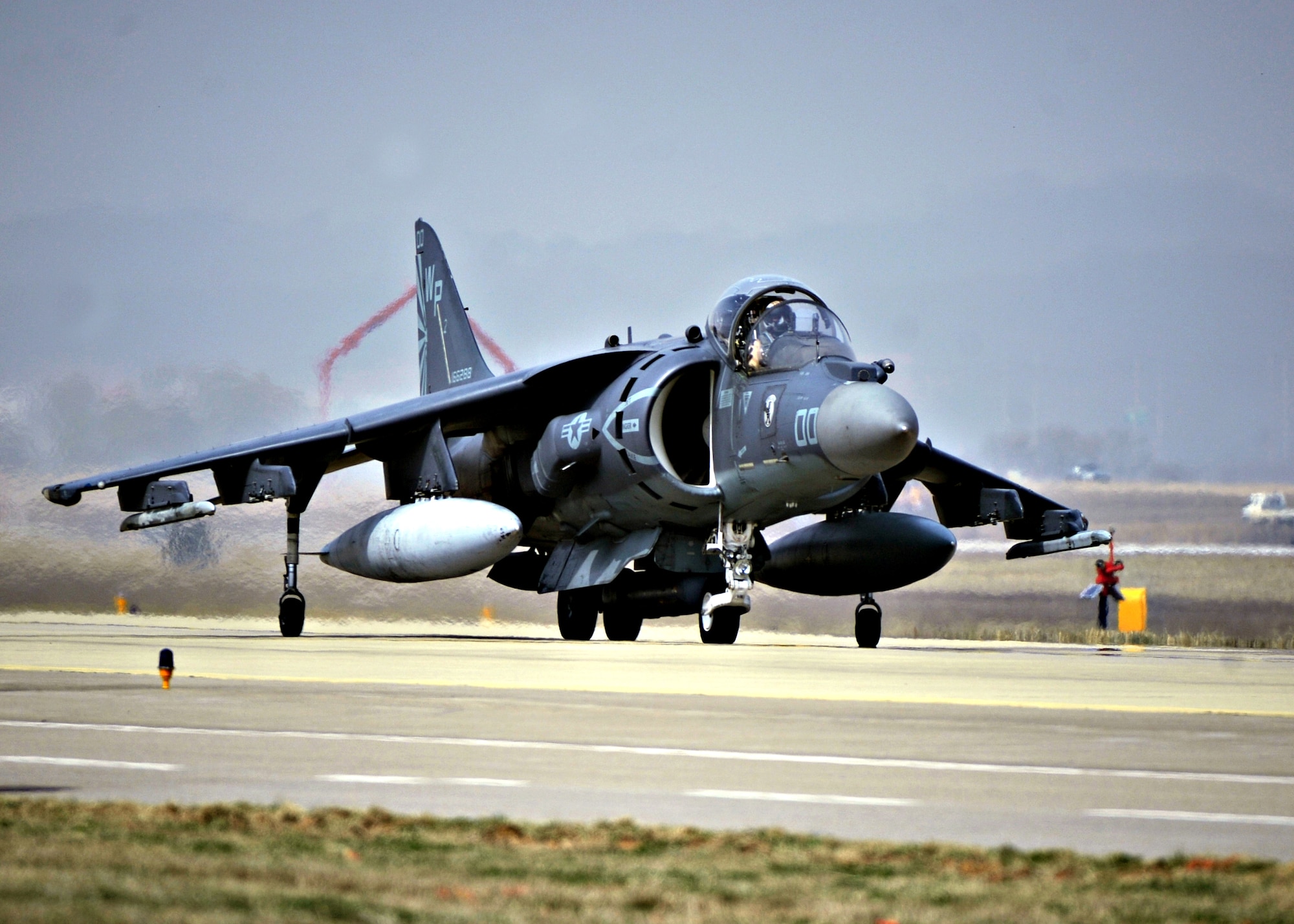 OSAN AIR BASE, Republic of Korea – A Marine AV-8B Harrier prepares for take-off on Osan Air Base, Republic of Korea, March 28, 2014. The Harrier is from VMA-223 out of Marine Corps Air Station Cherry Point, N.C. The Marines are on Osan to participate in Exercise Pacific Thunder, a joint, combined combat search and rescue exercise that will run April 14 – 18. The exercise will include A-10s and F-16s from the 51st Fighter Wing, F-16s from the 8th Fighter Wing, AV-8Bs from USMC's VMA-223, HH-60 Pave Hawks from the 18th Wing and numerous other ROKAF aircraft and accompanying personnel. (U.S. Air Force photo by Senior Airman Siuta B. Ika)
