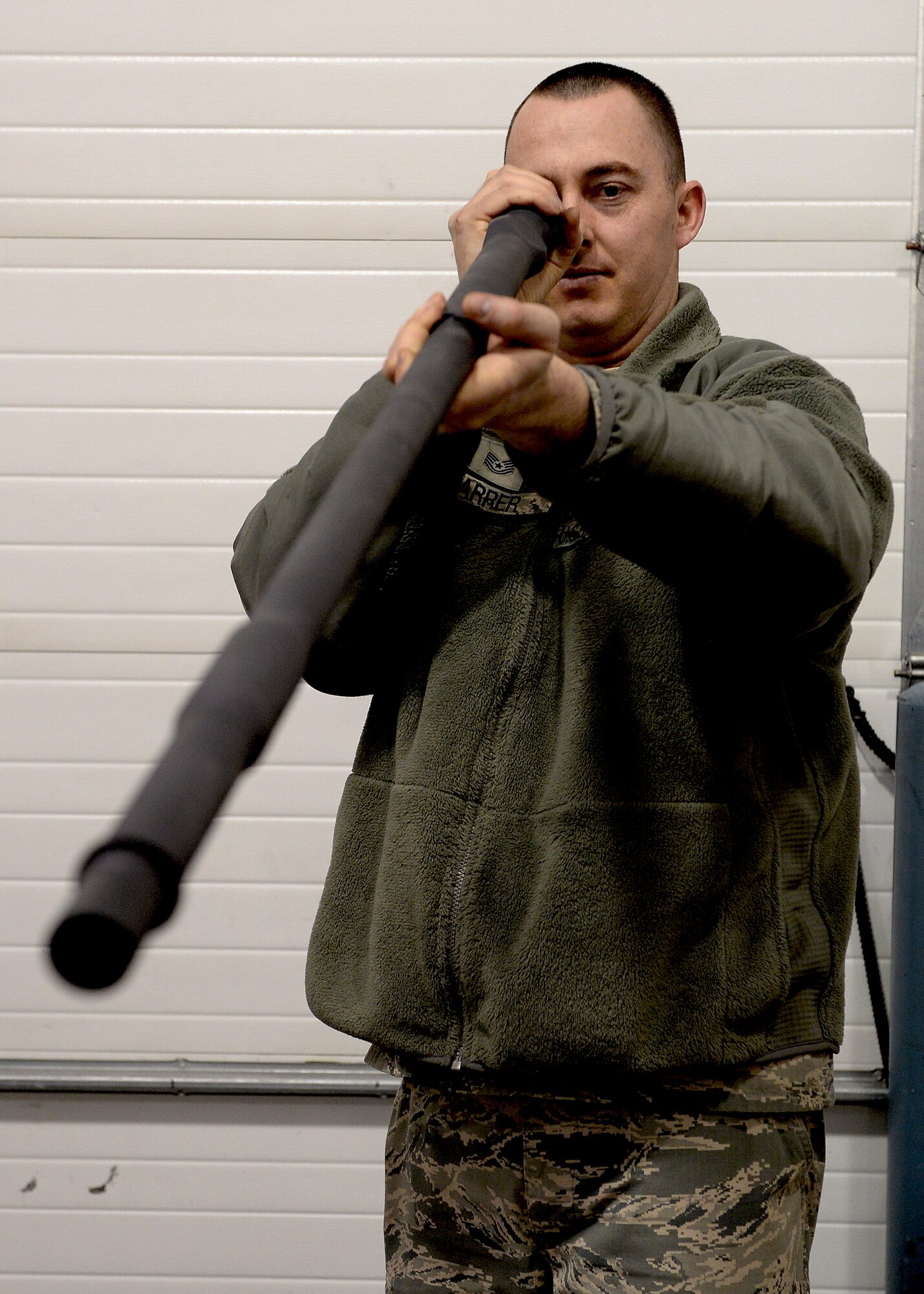 Tech. Sgt. Steven Farrer, 354th Maintenance Group weapons quality assurance inspector, checks rifling inside a barrel of an M-61 A1 20mm Vulcan cannon April 7, 2014, Eielson Air Force Base, Alaska. Farrer’s primary expertise is weapons systems, but he is qualified to inspect other F-16 Fighting Falcon operations. (U.S. Air Force photo by Staff Sgt. Shawn Nickel/Released)