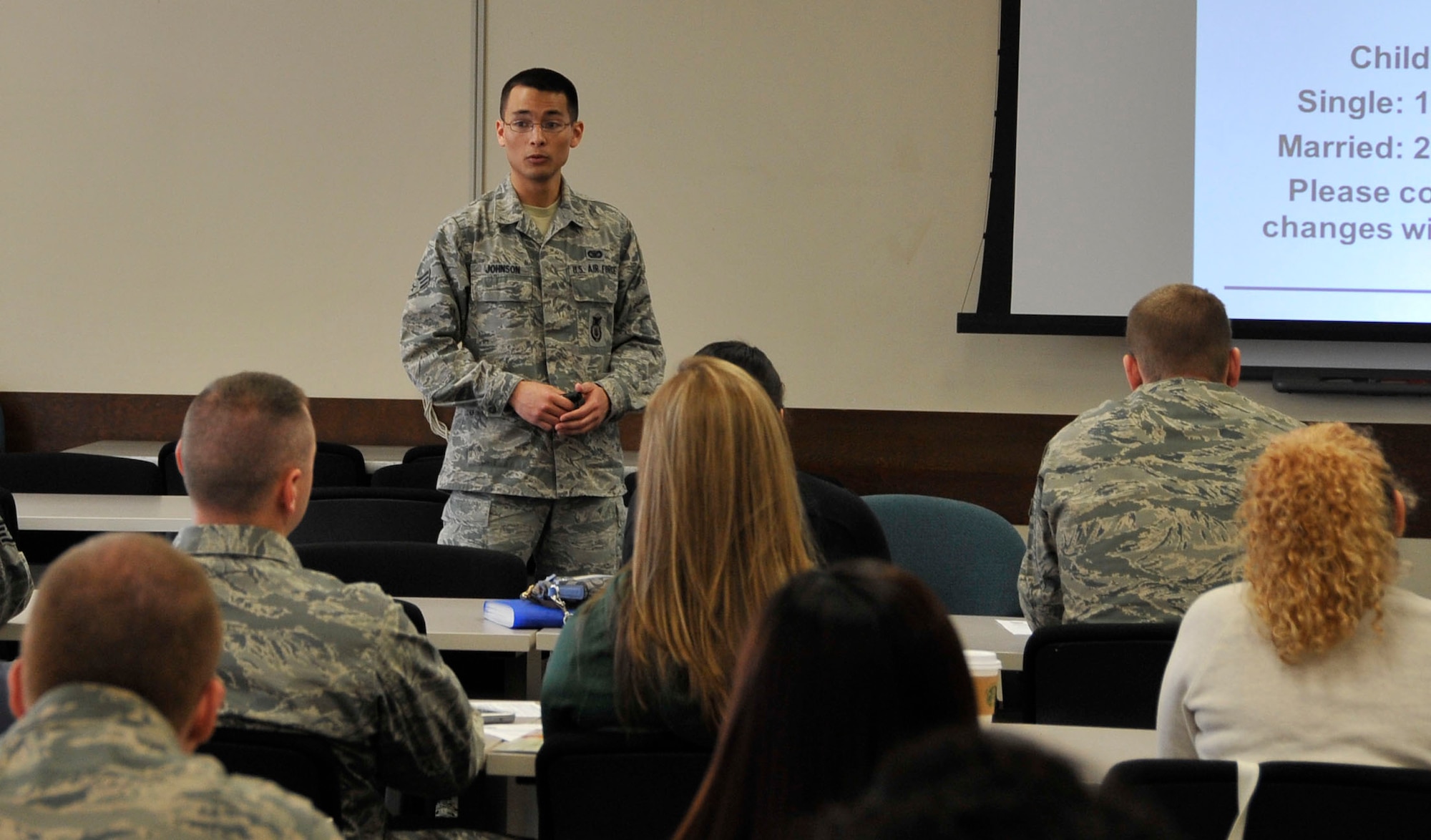 U.S. Air Force Senior Airman Jeremy Johnson, 35th Security Forces Squadron pass and registration clerk, teaches a driver safety class at Misawa Air Base, Japan, April 8, 2014. Some of Johnson’s duties include briefing in-processing Airmen and families on the services the pass and registration office provides, such as vehicle registration and photo identification. (U.S. Air Force photo/Airman 1st Class Patrick S. Ciccarone)