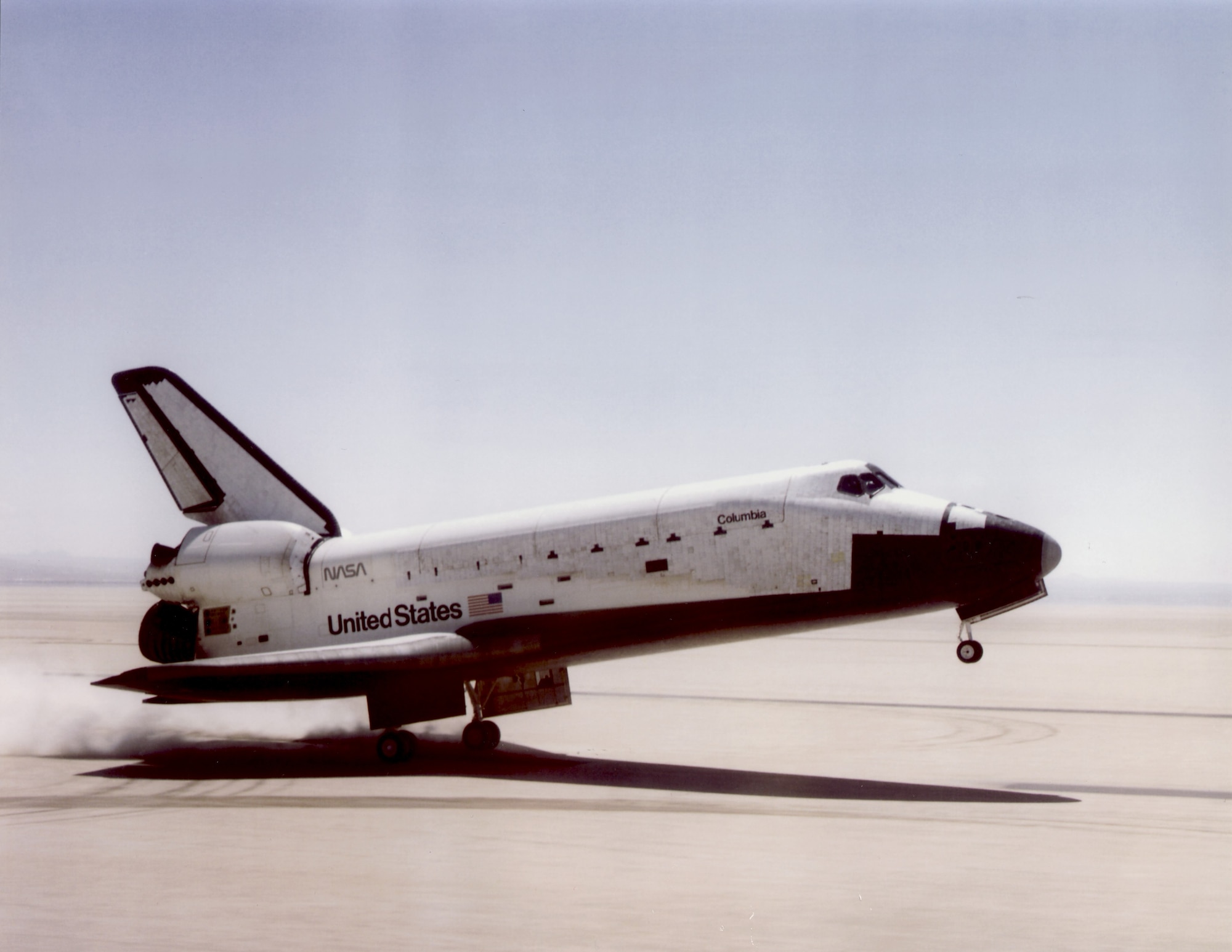 Space Shuttle Columbia lands April 14, 1981 on Rogers Dry Lake Bed at Edwards AFB. Monday marks 33 years since the first re-usable space vehicle successfully returned to Earth on the wings of an aircraft. (U.S. Air Force photo provided by the Air Force Test Center History Office) 