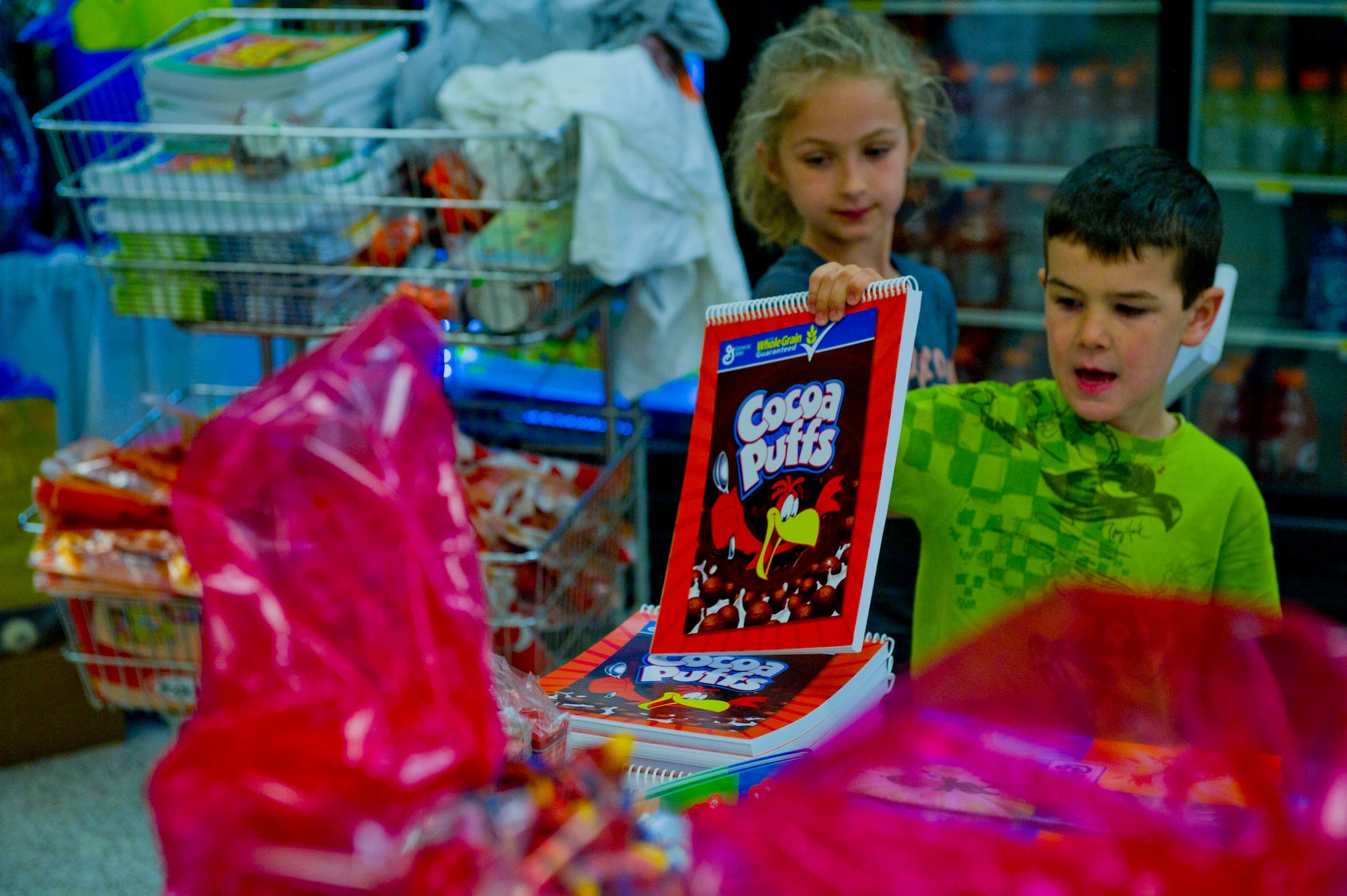 More than 500 Team Holloman dependents enjoy an active evening of learning at the annual Family Math Night at the Holloman Air Force Base Commissary, April 3. The event allows Holloman kids to develop their math skills in an interactive environment through grade-appropriate problems. Those participating could win prizes and also meet Sparky the Fire Dog and McGruff the Crime Dog. (U.S. Air Force photo by Airman 1st Class Chase Cannon/ Released)