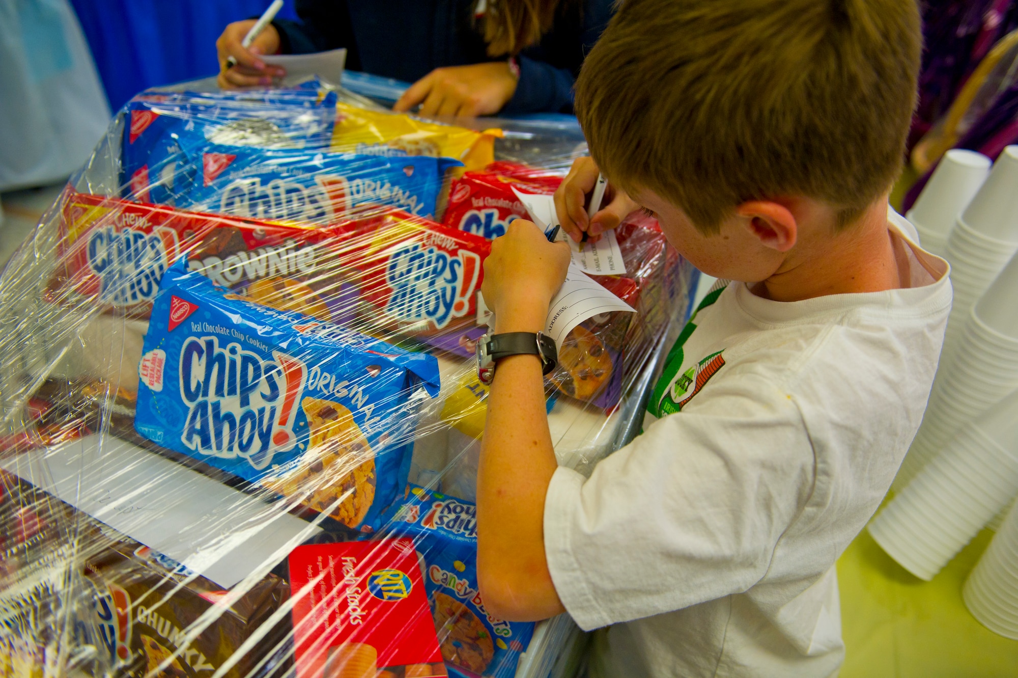 More than 500 Team Holloman dependents enjoy an active evening of learning at the annual Family Math Night at the Holloman Air Force Base Commissary, April 3. The event allows Holloman kids to develop their math skills in an interactive environment through grade-appropriate problems. Those participating could win prizes and also meet Sparky the Fire Dog and McGruff the Crime Dog. (U.S. Air Force photo by Airman 1st Class Chase Cannon/ Released)