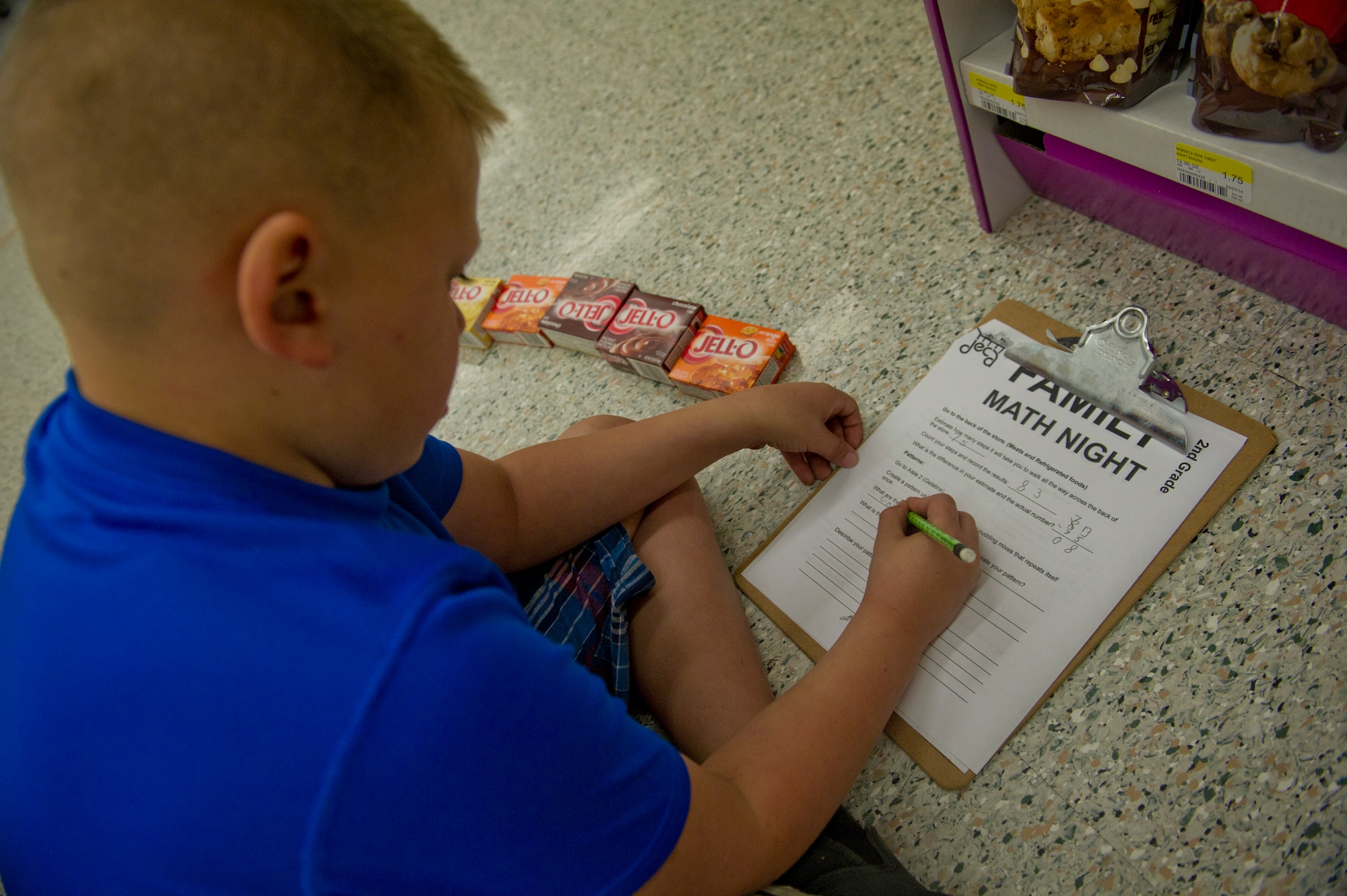 More than 500 Team Holloman dependents enjoy an active evening of learning at the annual Family Math Night at the Holloman Air Force Base Commissary, April 3. The event allows Holloman kids to develop their math skills in an interactive environment through grade-appropriate problems. Those participating could win prizes and also meet Sparky the Fire Dog and McGruff the Crime Dog. (U.S. Air Force photo by Airman 1st Class Chase Cannon/ Released)