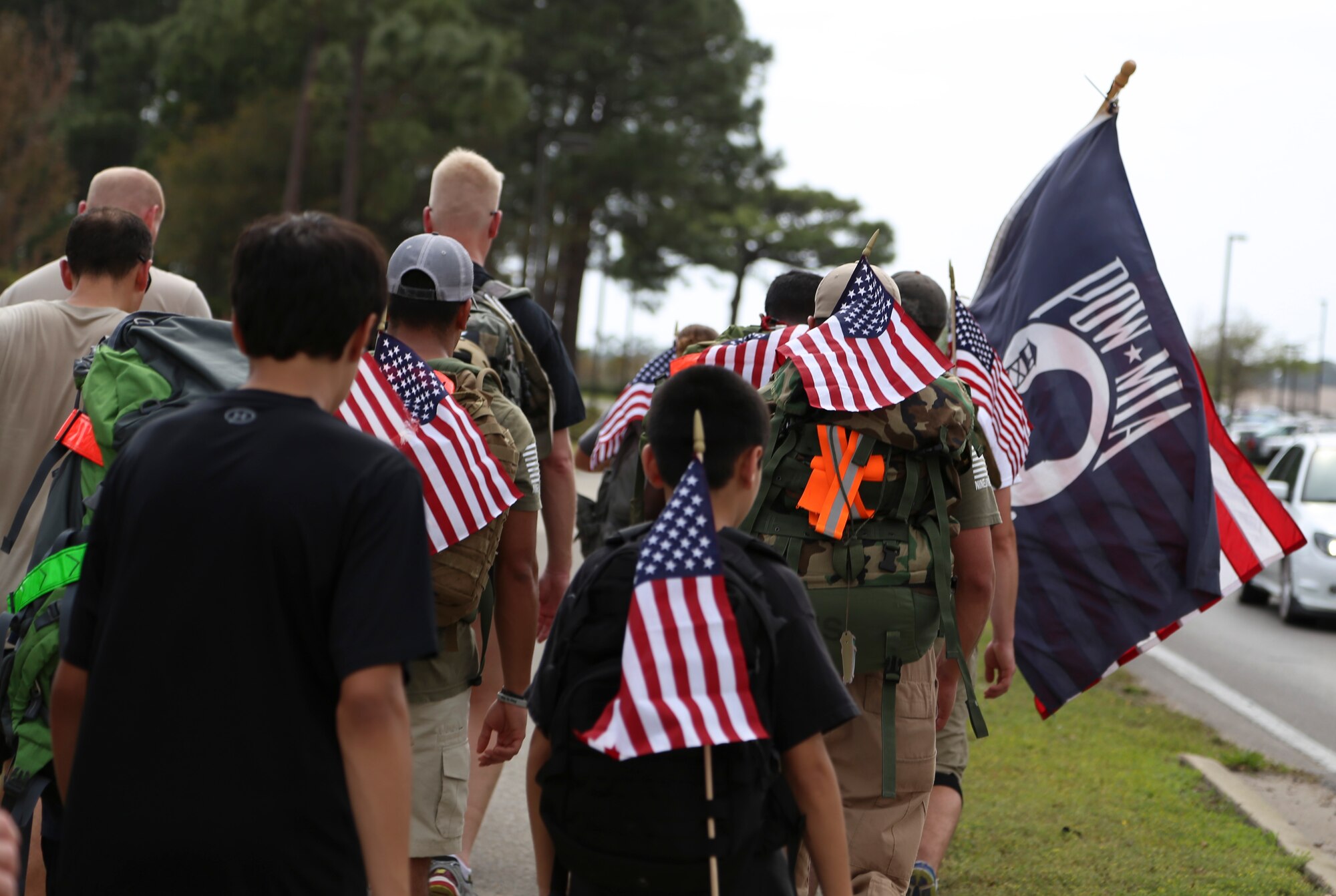 Airmen and supporters march to the Memorial Air Park at Hurlburt Field, Fla., April 4, 2014. Friends, family and supporters joined Air Commando ruckers during the final leg of their 450 mile journey, honoring Air Force Special Operations Command members killed since 9/11.
(U.S. Air Force photo/Staff Sgt. John Bainter)
