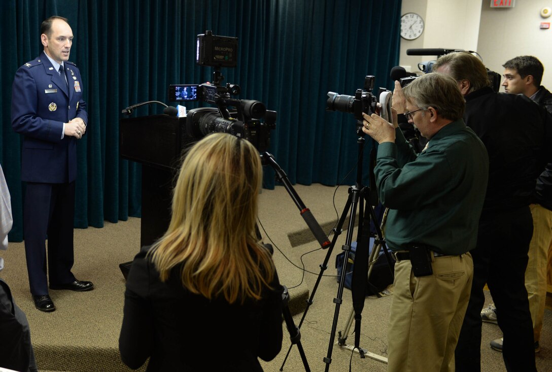 Col. Kevin Kennedy, 28th Bomb Wing commander, briefs media representatives during the State of Ellsworth briefing in the BW headquarters conference room at Ellsworth Air Force Base, S.D., April 4, 2014. The purpose of this meeting was to orient and update local news media on the base mission and events tied to Ellsworth. (U.S. Air Force photo by Senior Airman Zachary Hada/Released)