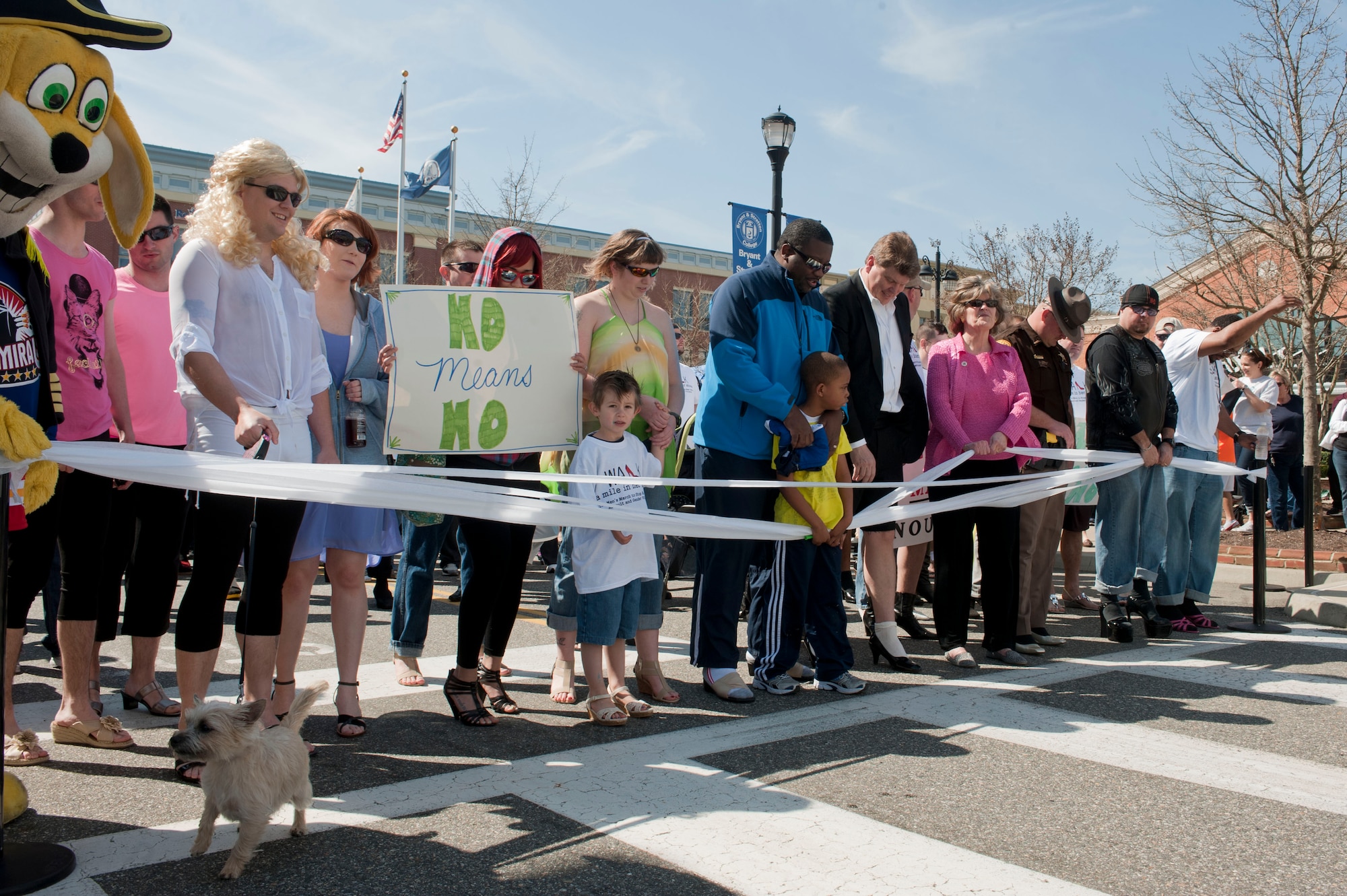 Walk a Mile in Her Shoes attendees stand at the starting line minutes before the event begins in Hampton, Va., April 5, 2014. It is held in support of Sexual Assault Awareness Month. (U.S. Air Force photo by Staff Sgt. Stephanie Plichta/Released) 
