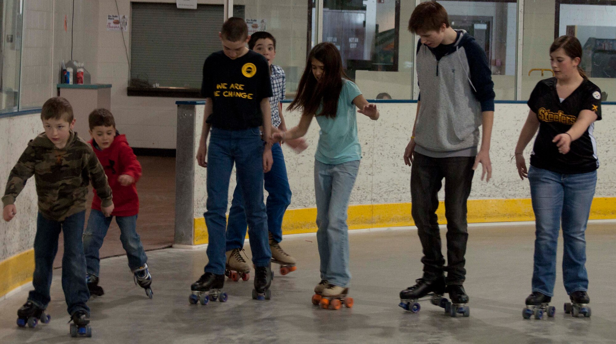 140402-F-GZ967-059 A group of children participate in roller skating April 2 as part of Outdoor Recreation’s BRAT camp. (U.S. Air Force photo by Airman 1st Class Brandon Valle)