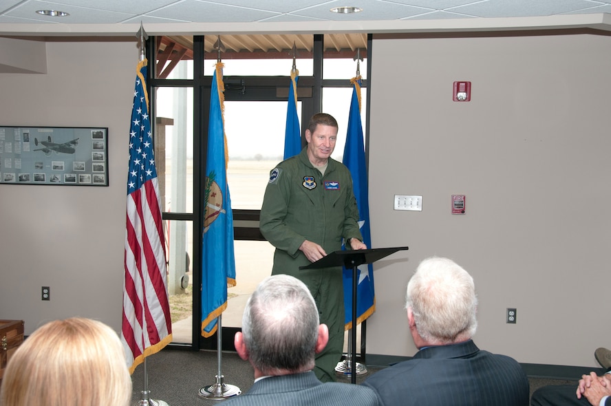 Gen. Robin Rand, commander of Air Education and Training Command, speaks to Enid, Okla., community leaders before presenting the city with the Altus Trophy April 2 at the Woodring Regional Airport in Enid. The Altus Trophy is presented to the civilian community that best supports its host AETC base. Enid received the trophy for the first time since the awards inception. (U.S. Air Force photo/Terry Wasson)