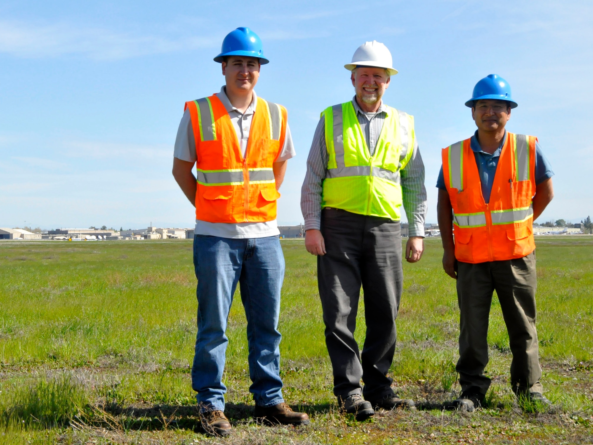 FORMER MCCLELLAN AIR FORCE BASE, Calif. -- From left, the Air Force Civil Engineer Center team of Mark Fossi, Paul Bernheisel and Gary Yuki monitor compliance at closed bases throughout the western region, like at MCClellan, in Sacramento, Calif. (U.S. Air Force photo/Scott Johnston)