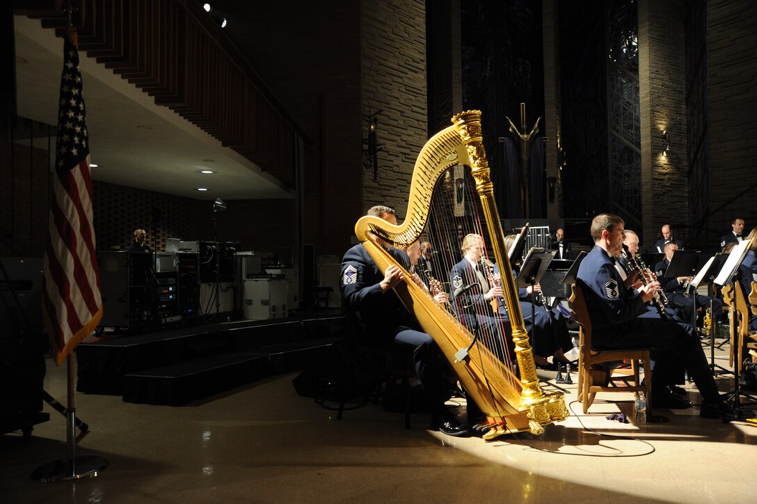 Airmen in the U.S. Air Force Concert Band perform during the U.S. Air Force Band’s 2014 Spring Concert Tour show at Valparaiso University in Valparaiso, Ind., April 7, 2014. As part of the tour, the Band’s musicians and vocalist are traveling across Illinois, Indiana and Michigan, performing concerts for audiences and presenting clinics and master classes to high school and college students. (U.S. Air Force photo/Master Sgt. Tammie Moore)
