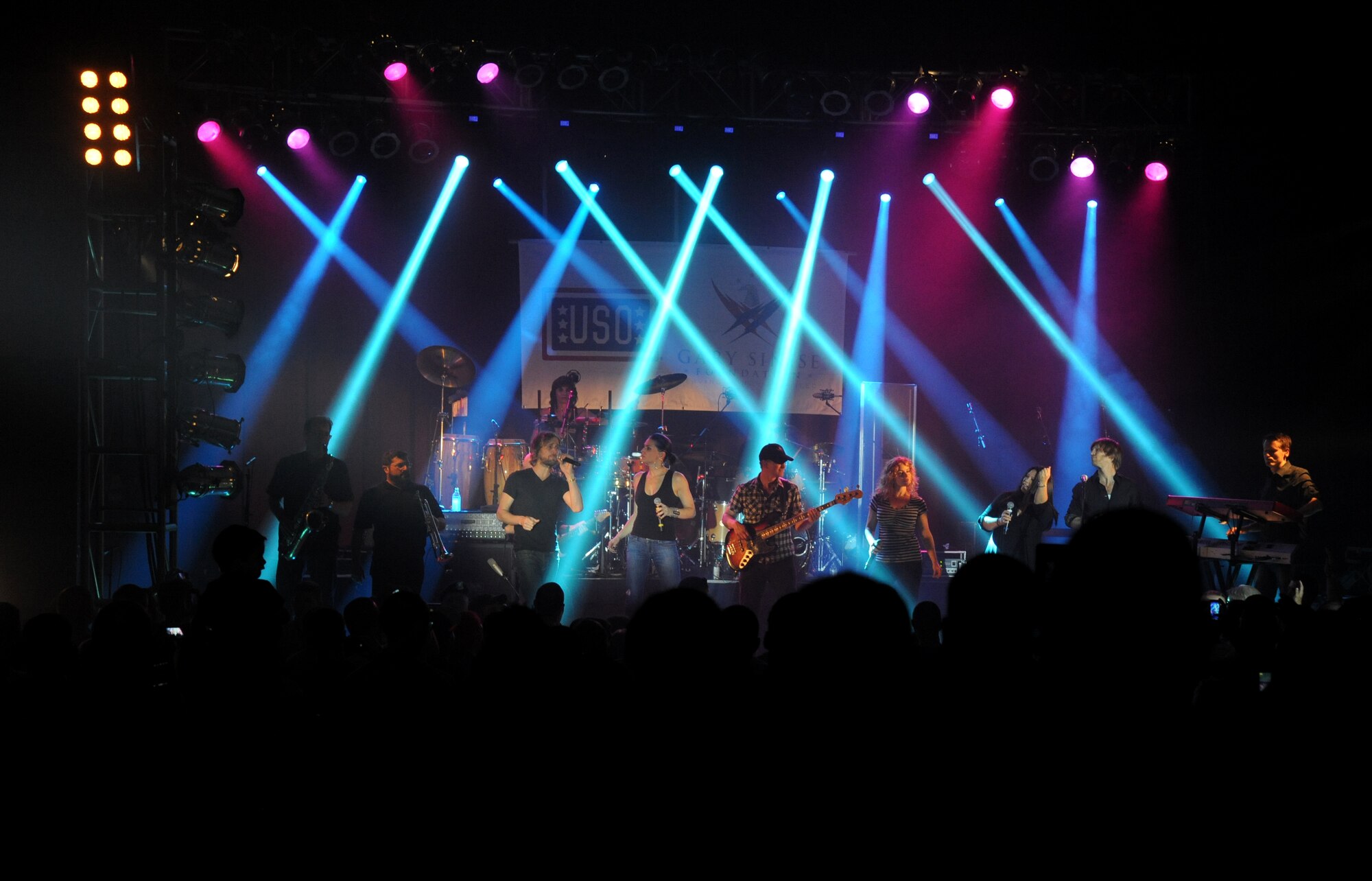 Gary Sinise & the Lt. Dan Band performs for Keesler personnel during a concert April 4, 2014, at the Welch Theater, Keesler Air Force Base, Miss.  The band visited Keesler during their morale-boosting 2014 USO tour of U.S. military bases.  They are also a program of the Gary Sinise Foundation, a nonprofit organization that supports and honors national defenders, veterans and first responders. (U.S. Air Force photo by Kemberly Groue)
