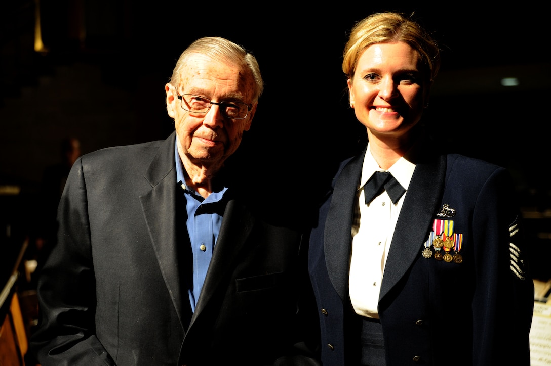 Senior Master Sgt. Stacy Newbrough Ascione and Walfrid Kujala pose for a photo after the U.S. Air Force Band’s 2014 Spring Concert Tour show at Valparaiso University in Valparaiso, Ind., April 7, 2014. Ascione, a flautist with the Concert Band and a native of Iowa City, Iowa, studied music under Kujala, who  retired from the Chicago Symphony in 2001, and has been a professor emeritus at Northwestern University since 2012. (U.S. Air Force photo/Master Sgt. Tammie Moore)