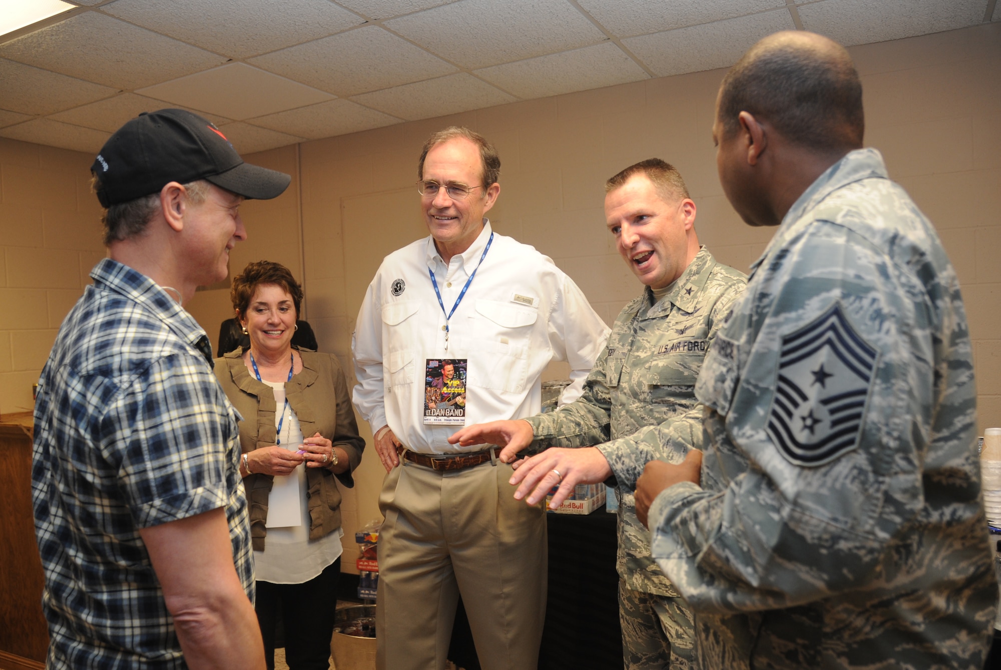 Gary Sinise is greeted back stage by The Honorable Delbert Hosemann, Mississippi Secretary of State, and his wife, Lynn; Brig. Gen. Patrick Higby, 81st Training Wing commander, and Chief Master Sgt. Farrell Thomas, 81st TRW command chief, prior to a Gary Sinise & The Lt. Dan Band concert April 4, 2014, at the Welch Theater, Keesler Air Force Base, Miss.  The band visited Keesler during their morale-boosting 2014 USO tour of U.S. military bases.  They are also a program of the Gary Sinise Foundation, a nonprofit organization that supports and honors national defenders, veterans and first responders. (U.S. Air Force photo by Kemberly Groue)