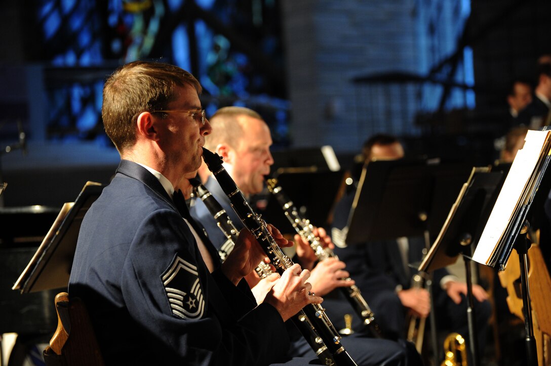Senior Master Sergeant Brian G. McCurdy and fellow clarinetist perform “Dizzy Fingers” during the U.S. Air Force Band’s 2014 Spring Concert Tour at Valparaiso University in Valparaiso, Ind., April 7, 2014. McCurdy, a native of Virginia Beach, Va., received a Bachelor of Music in clarinet performance from Shenandoah University and a Master of Music from the University of Maryland. Sergeant McCurdy is currently pursuing a Doctor of Musical Arts from George Mason University. (U.S. Air Force photo/Master Sgt. Tammie Moore) 