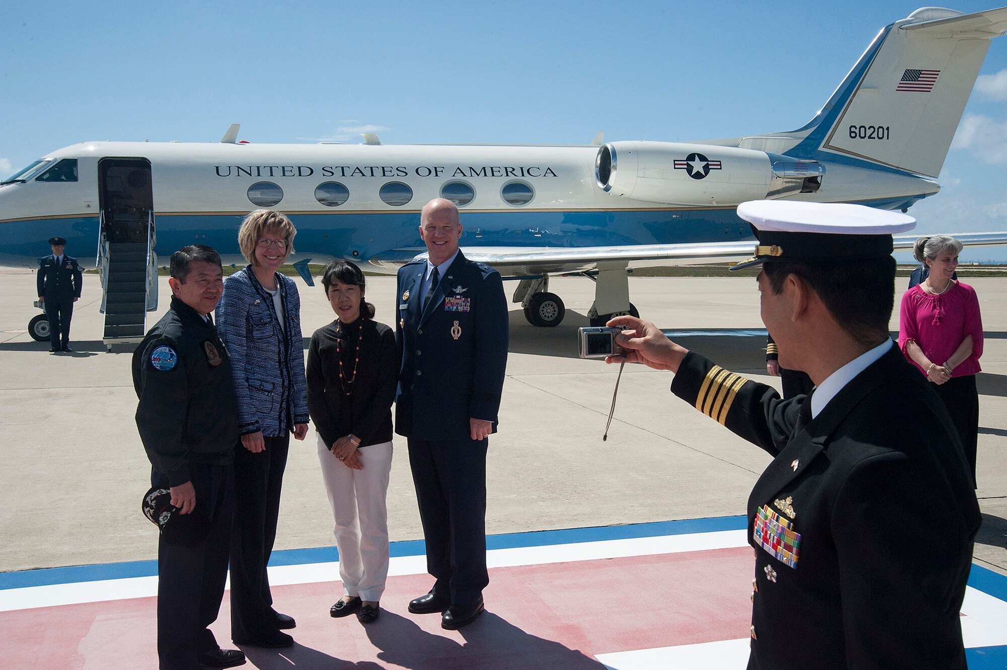(Left to right) General Shigeru Iwasaki, Chief of Staff, Joint Staff Japanese Self Defense Forces, Mollie Raymond, wife of Lt. Gen. John W. “Jay” Raymond, JFCC Space and 14th AF commander, Toshiko Iwasaki, wife of General Iwasaki, and Lt. Gen. John W. “Jay” Raymond, pose for a group photo April 1, 2014, Vandenberg Air Force Base, Calif. General Iwasaki, his wife and members of his senior staff visited Vandenberg to learn more about the mission of the 14th Air Force and 30th Space Wing. (U.S. Air Force Photo/Michael Peterson) 