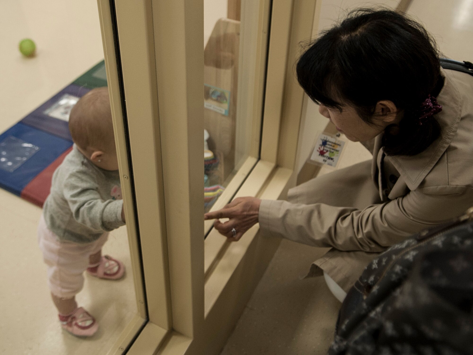 Toshiko Iwasaki, wife of General Shigeru Iwasaki, Chief of Staff, Joint Staff Japanese Self Defense Forces, visits the Child Development Center, April 1, 2014, Vandenberg Air Force Base, Calif. General Iwasaki, his wife and members of his senior staff visited Vandenberg to learn more about the mission of the 14th Air Force and 30th Space Wing. (U.S. Air Force Photo/Airman 1st Class Yvonne Morales)