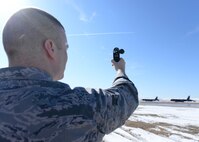 Senior Airman Shane Yurkus, 28th Operations Support Squadron Weather Flight forecaster, uses a Kestrel handheld weather sensor to check wind speed at Ellsworth Air Force Base, S.D., April 5, 2014. The Weather Flight focuses on three main functions – airfield support, mission integration and weather updates. (U.S. Air Force photo by Airman 1st Class Rebecca Imwalle /Released)