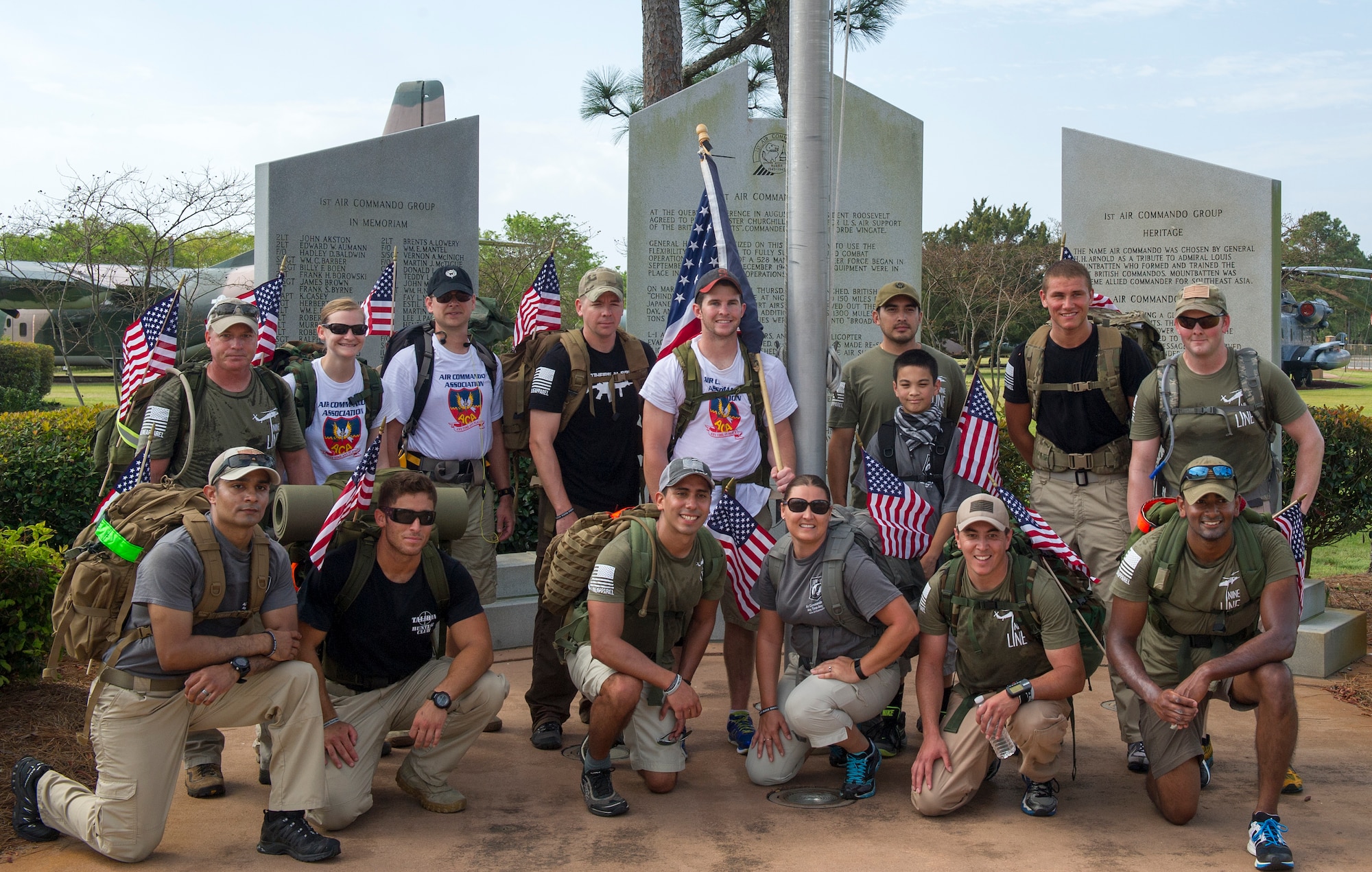 The Air Commando Ruckers pose for a group photo after completing the 3rd Annual Air Commando Ruck March at the Hurlburt Field Air Park April 4, 2014. The Air Commando Ruckers marched 450 miles from MacDill Air Force Base, Fla., to Hurlburt Field, Fla. (U.S. Air Force photo/Airman 1st Class Jeff Parkinson)
