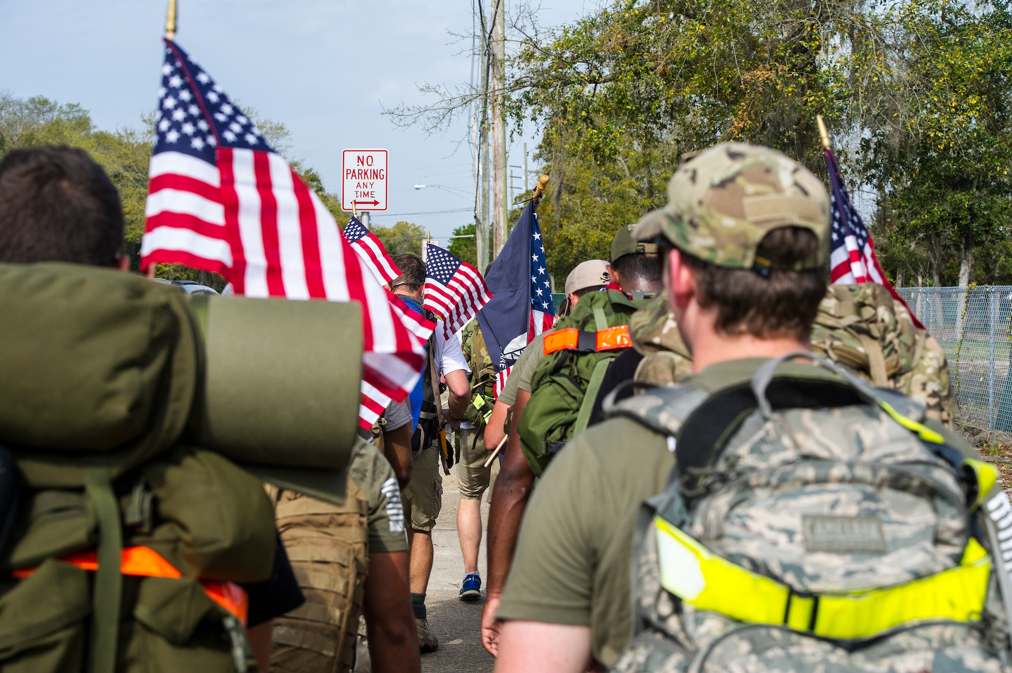 The Air Commando Ruckers complete their final leg of the 3rd Annual Air Commando Ruck March in Fort Walton Beach, Fla., April 4, 2014. The Air Commando Ruckers marched 450 miles from MacDill Air Force Base, Fla., to Hurlburt Field, Fla. (U.S. Air Force photo/Airman 1st Class Jeff Parkinson)