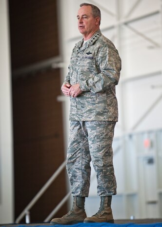 Air Force Chief of Staff Gen. Mark A. Welsh III, speaks to Airmen during a town-hall style meeting, April 7, 2014 at Nellis Air Force Base, Nev.  Welsh, along with Chief Master Sgt. of the Air Force James A. Cody and their spouses, Betty and Athena, visited Nellis to thank Airmen and their families for their many contributions and sacrifices. (U.S. Air Force photo by Senior Airman Jason Couillard)