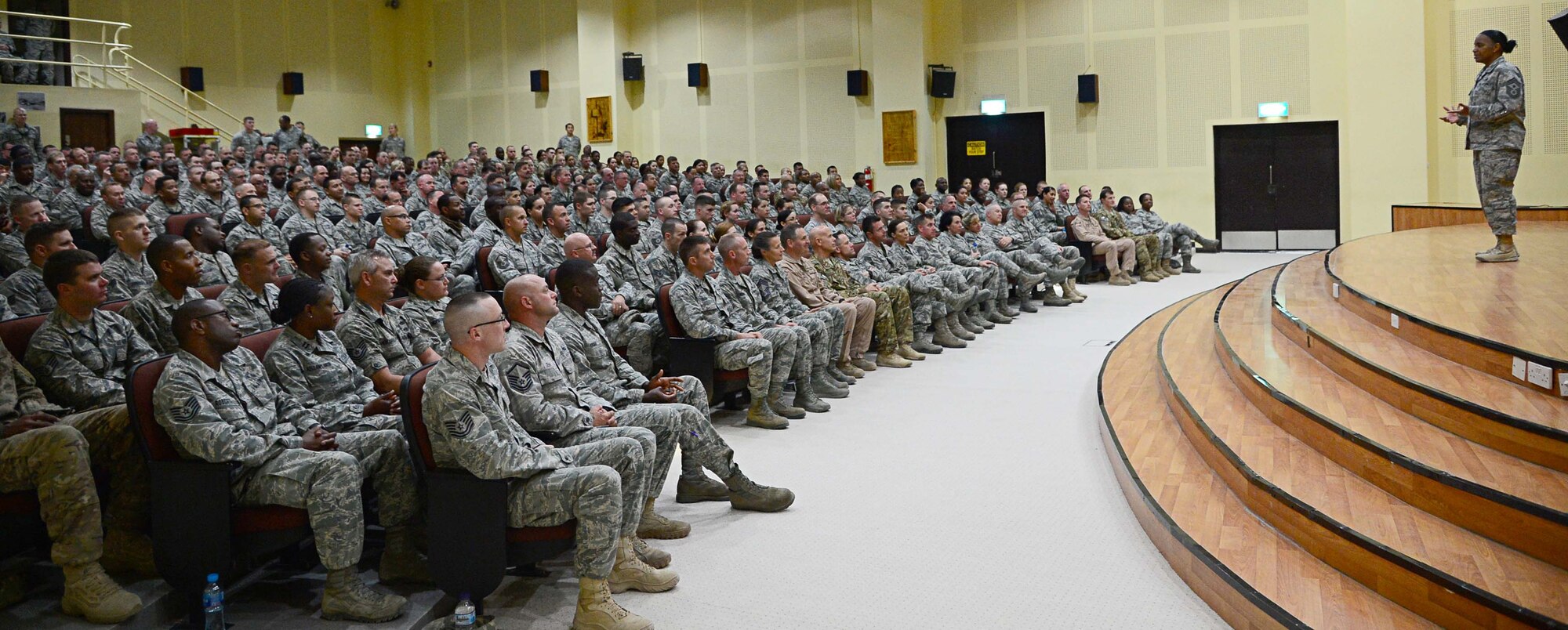 Air Forces Central Command Chief Master Sgt. Shelina Frey talks with Airmen
from the 386th Air Expeditionary Wing at an undisclosed location in Southwest Asia. Frey served as the commander's advisor regarding issues of the health, morale and welfare of the enlisted force in the area of responsibility. She met with and recognized numerous Airmen for their continuous service to the U.S. Air Force during Operation Enduring Freedom. (U.S. Air Force photo by Senior Airman Desiree W. Moye)
