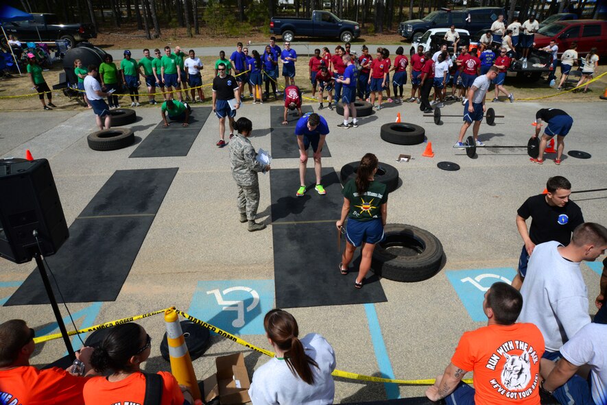 U.S. Air Force Airmen participate in a crossfit challenge during the 20th Mission Support Group Warrior Challenge at Shaw Air Force Base, S.C., April 4, 2014. During the day Airmen participated in various events to boost morale and camaraderie within the 20th MSG. (U.S. Air Force photo by Airman 1st Class Michael A. Cossaboom)