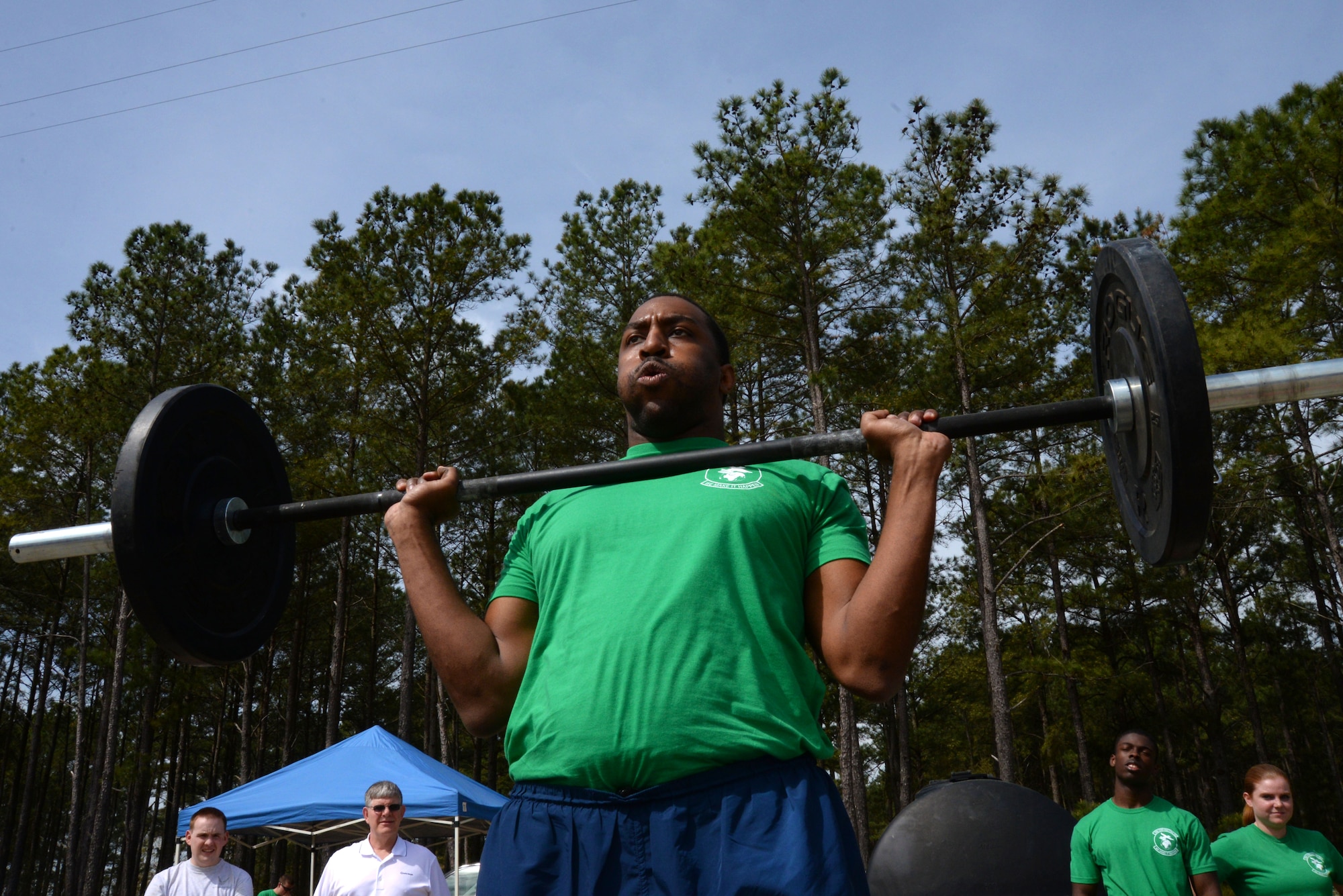 U.S. Air Force Staff Sgt. Aaron Trammell, 20th Contracting Squadron contingency contract officer, attempts a power clean during the 20thMission Support Group Warrior Challenge at Shaw Air Force Base, S.C., April 4, 2014. Several events were held throughout the day to boost morale and camaraderie within the 20th MSG. (U.S. Air Force photo by Airman 1st Class Michael A. Cossaboom)