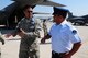 Master Sgt. Stephen Dobles, an aircraft maintenance technician with the 149th Fighter Wing, Texas Air National Guard, exchanges maintenance practices with his counterpart with the FACH (Fuerza Aerea de Chile) during FIDAE (Feria Internacional del Aire y del Espacio), an international trade air and space show, in Santiago, Chile, March 26, 2014. Members of the Texas Air National Guard were in Chile as part of the National Guard Bureau's State Partnership Program. (U.S. Air National Guard photo by Senior Master Sgt. Miguel D. Arellano / Released)