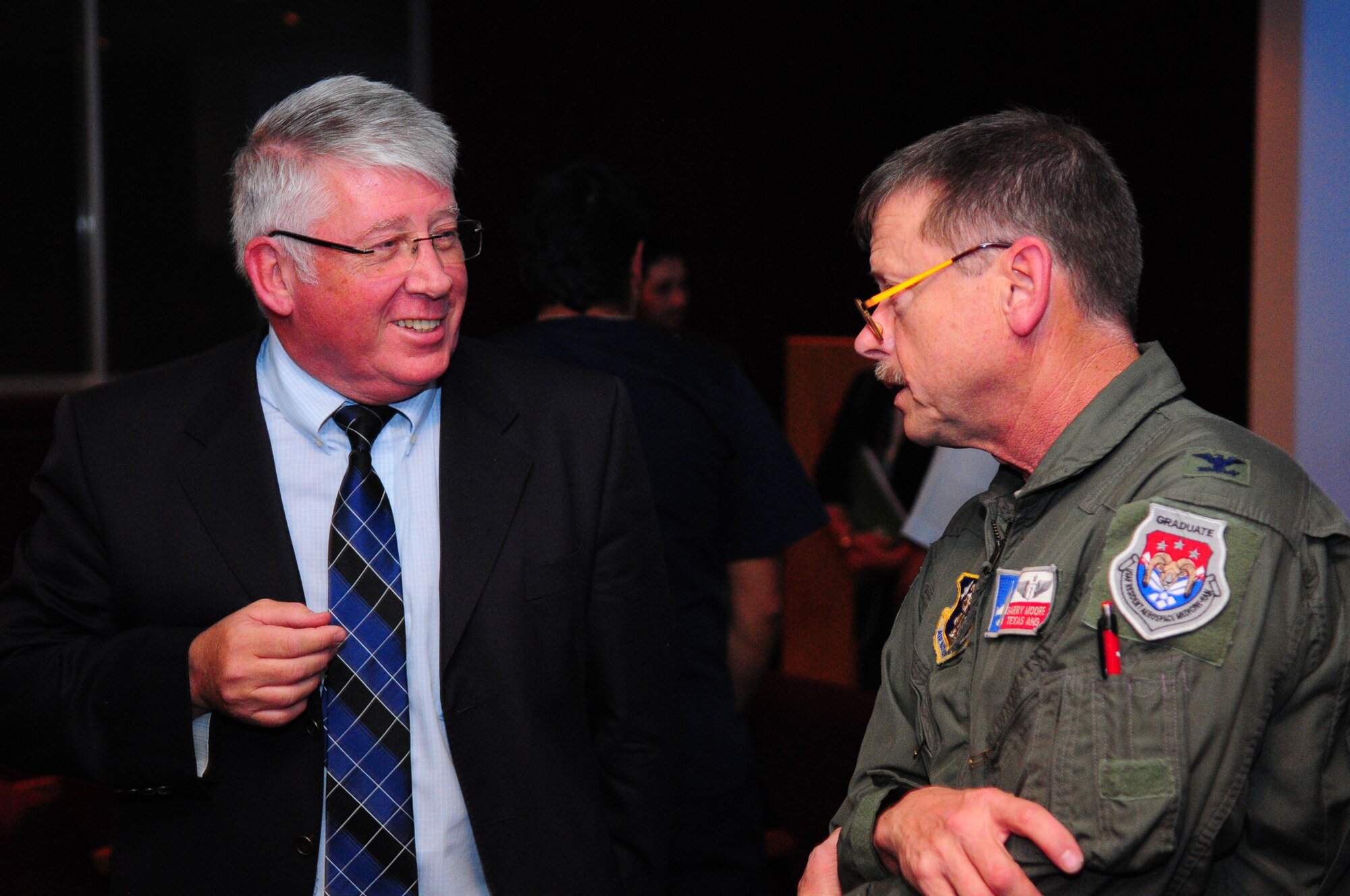 Maj. Gen. Charles Cunliffe (Ret.), Fuerza Aerea Chile (FACh) discusses emergency medical and aeromedical evacuation issues with Colonel Garrie Moore, Air Surgeon for the State of Texas, during a Subject Matter Expert (SME) exchange presentation March 24, 2014 at the FACh hospital in Santiago, Chile.  The SME exchange of information is part of the U.S. National Guard?s State Partnership Program (SPP) and is held during the annual Chilean FIDAE Air Show. (U.S. Air National Guard photo by Senior Master Sgt. Mike Arellano / Released)