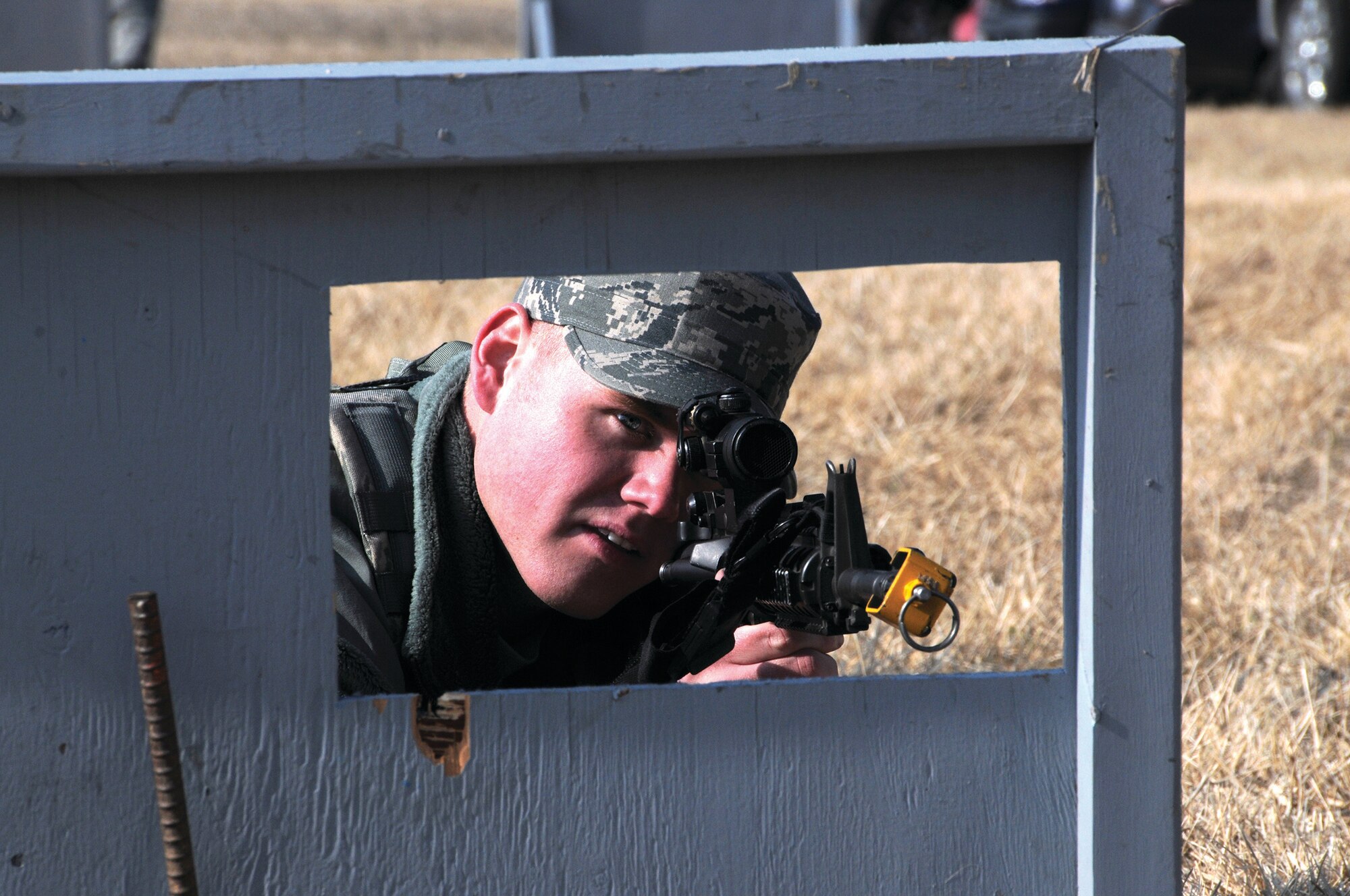 WRIGHT-PATTERSON AIR FORCE BASE, Ohio - Senior Airman Nicholas Livingston, 445th Security Forces Squadron, practices maneuvering techniques during his squadron’s “shoot, move, communicate” training event March 9. (U.S. Air Force photo/Tech. Sgt. Anthony Springer)