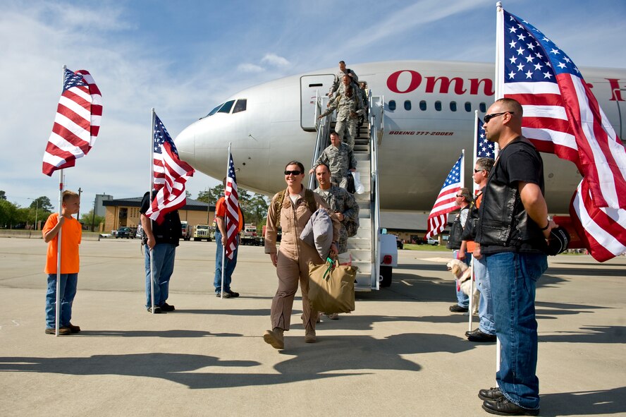 Members of the Guardian Brotherhood, a local organization dedicated to helping service members, welcome home nearly 300 Airmen, April 5, 2014, at Seymour Johnson Air Force Base, N.C.  (Note: The Guardin Brotherhood is a private organization.  It has no government status and is not endorsed by the U.S. Air Force in any way.)   The Airmen returned from a deployment to Southwest Asia as part of the 380th Air Expeditionary Wing.  (U.S. Air Force photo/Airman 1st Class Brittain Crolley)