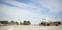 An aircraft carrying nearly 300 4th Fighter Wing Airmen taxis on the flightline, April 5, 2014, at Seymour Johnson Air Force Base, N.C.  The Airmen returned from a deployment to Southwest Asia as part of the 380th Air Expeditionary Wing.  (U.S. Air Force photo/Airman 1st Class Brittain Crolley)