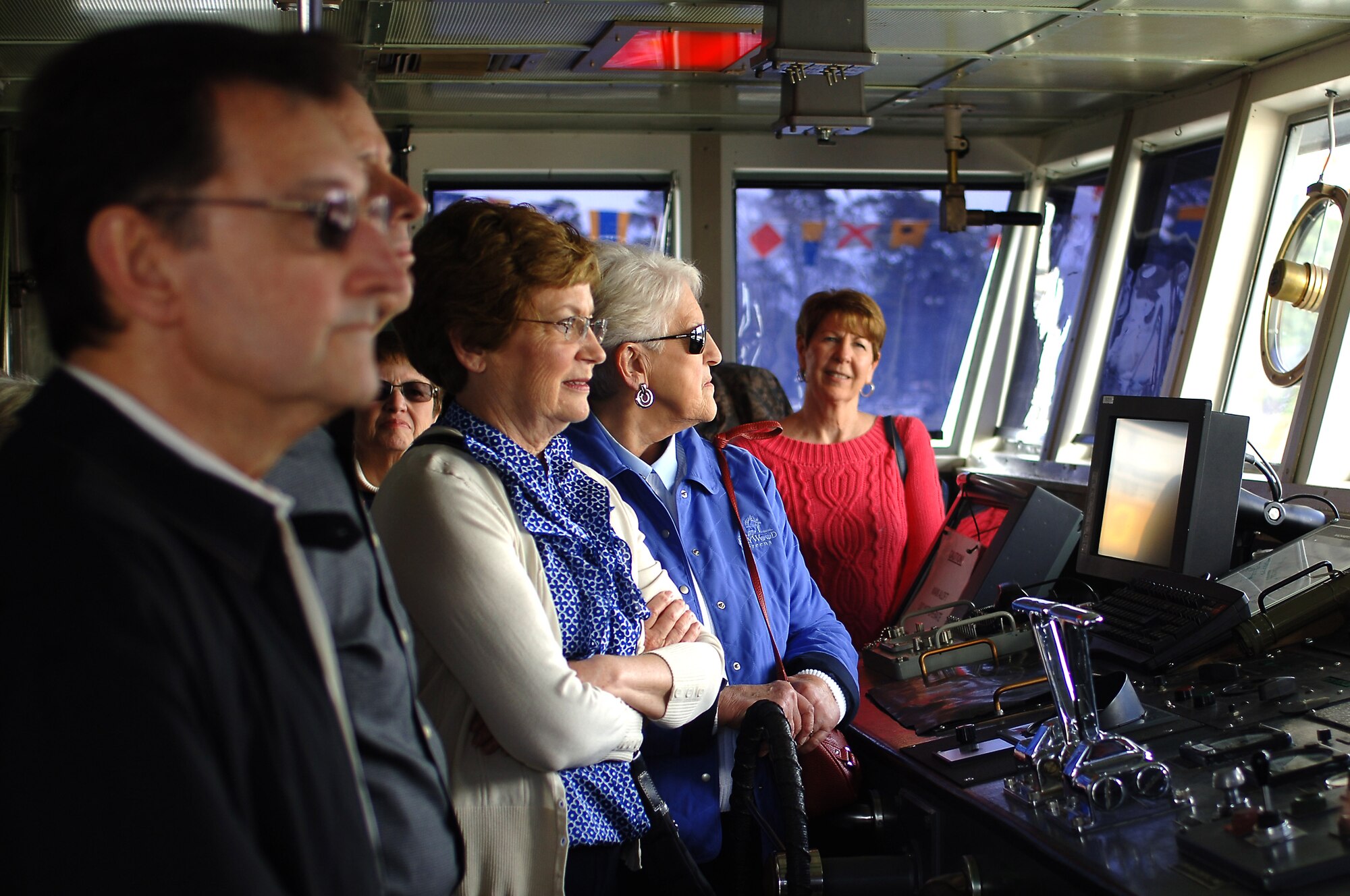 Members of the Williamsburg Area Chamber and Tourism Alliance Community Leadership Service program tour the U.S. Army Vessel Chickahominy during an installation tour at Fort Eustis, Va., April 1, 2014. Visitors received a presentation on the many missions performed by various unites on the installation, including the Simulations Center, the 7th Transportation Brigade (Expeditionary) waterborne operations at 3rd Port, the 128th Aviation Brigade helicopter maintenance facility and U.S. Army Training and Doctrine Command headquarters. (U.S. Air Force photo by Senior Airman Teresa J.C. Aber/Released)