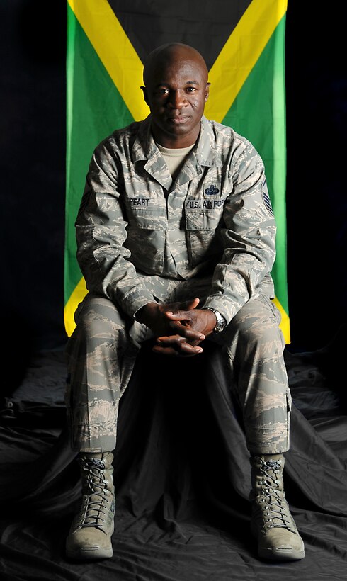 U.S. Air Force Master Sgt. Kenry Peart, 633rd Communications Squadron knowledge operations section chief, lived in Jamaica with his great aunt until the age of ten. Peart recalled the journey that led him to become an American Airman--an experience he said he will never forget. (U.S. Air Force photo illustration by Airman 1st Class Victoria H. Taylor/Released)