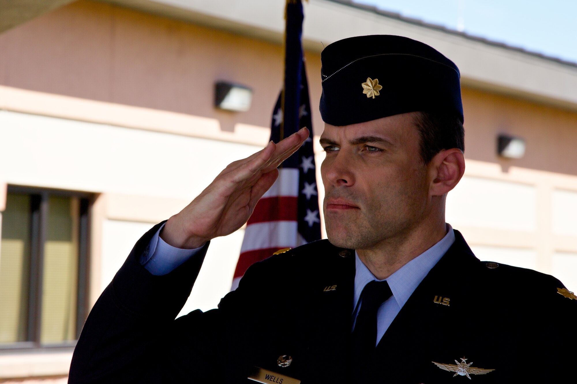 Maj. Michael D. Wells, commander of the 482nd Communication Squadron, salutes the members of the 482nd CS for the first time during an Assumption of Command Ceremony April 5 at Homestead Air Reserve Base, Fla. Wells assumes command of the 482nd CS after serving as chief of inspection plans for Air Force Reserve Command Headquarters at Robins Air Force Base, Ga. (U.S. Air Force photo by/Tech. Sgt. Lionel Castellano)